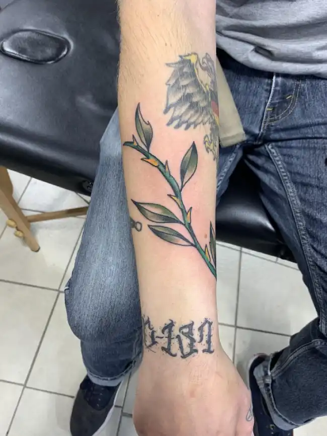 What does a thorn vine tattoo symbolize?