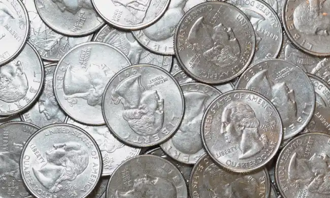 What is the spiritual significance of finding quarters?