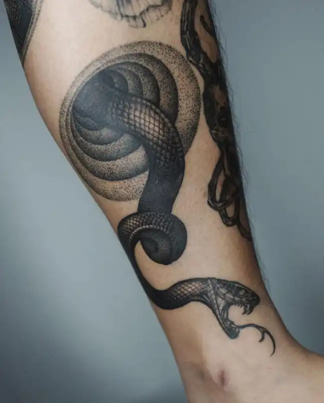 What is the symbolic meaning of a sea serpent tattoo?